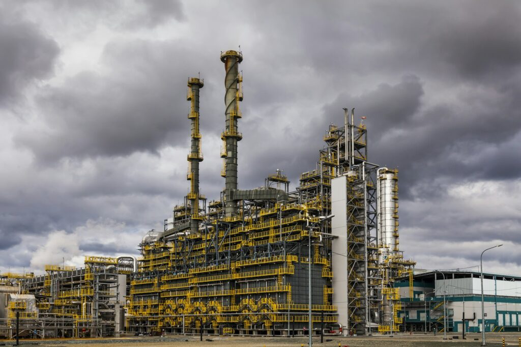 Oil Refinery factory at the cloudy sky, petrochemical plant, Pet